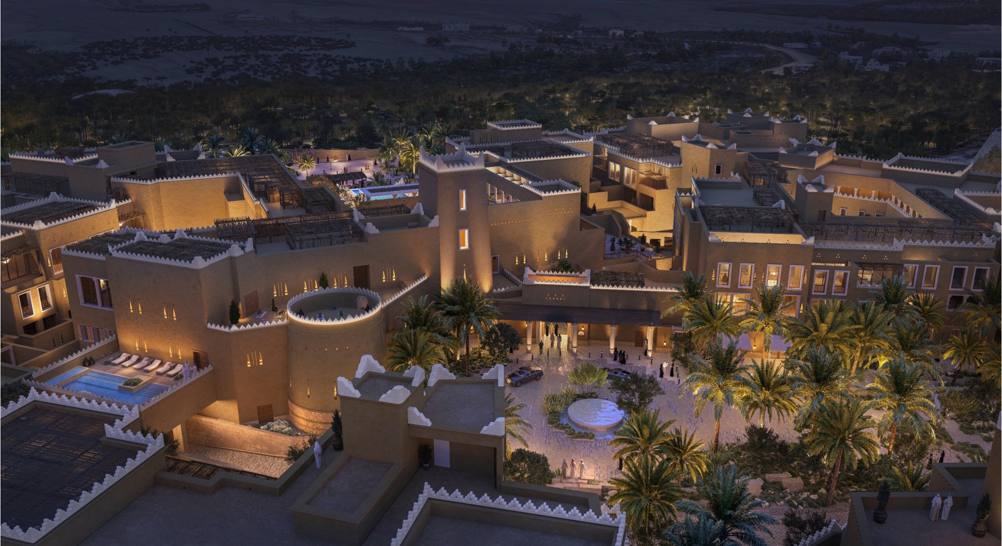 The Raffles Hotel Diriyah illuminated at night